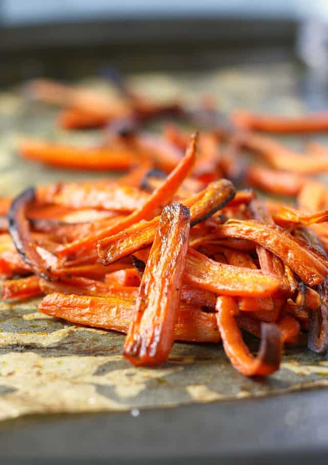 easy roasted carrot fries on a cookie sheet