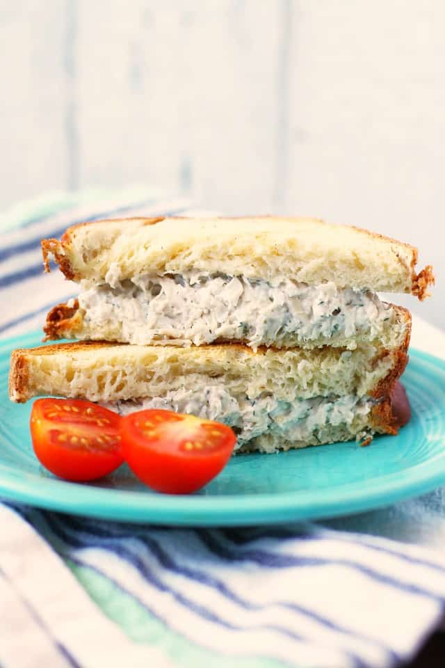 dairy free chicken salad sandwiches on a blue plate