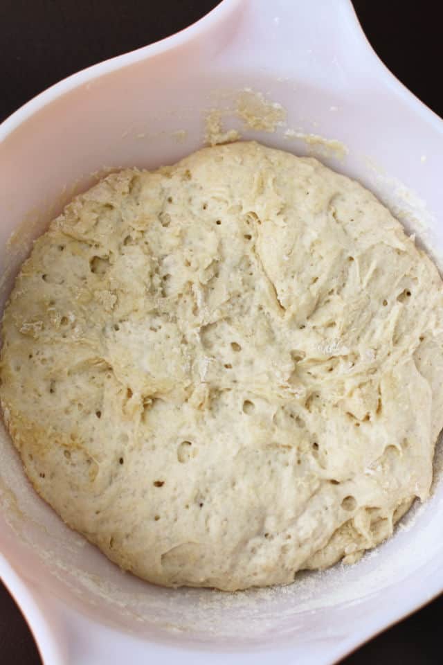 vegan dough rising in bowl