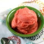 strawberry nice cream in a green bowl