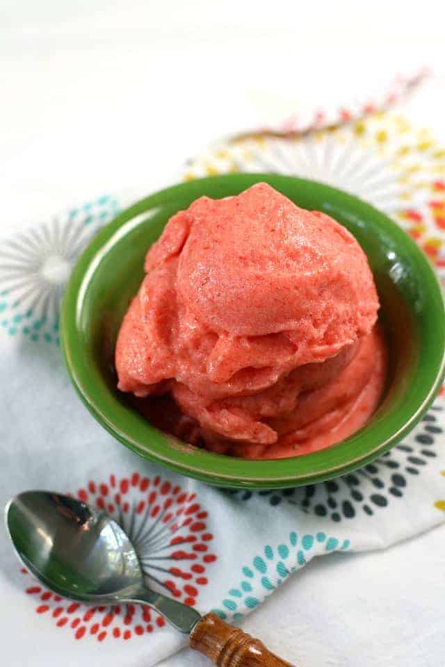 strawberry nice cream in a green bowl