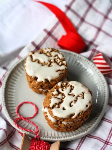 gluten free old fashioned iced oatmeal cookies on a plate