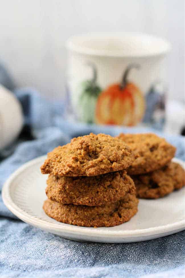 pumpkin spice oat flour cookies on a white plate
