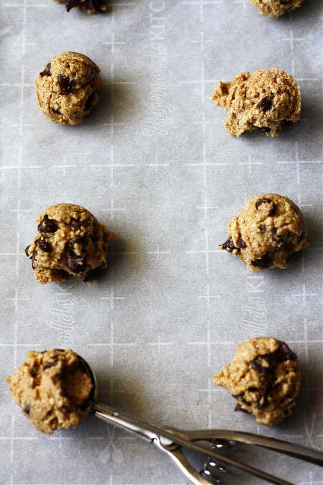 cookie dough scooped onto a baking sheet