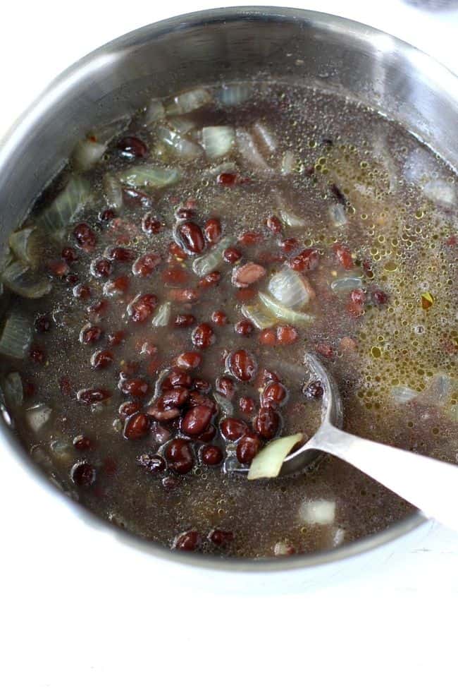 black bean soup in a soup pot