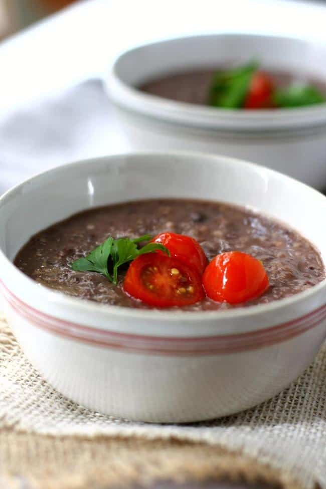 dairy free black bean soup in white bowls