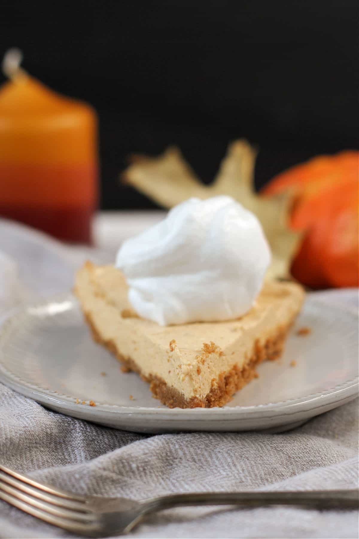 vegan pumpkin cheesecake with whipped topping