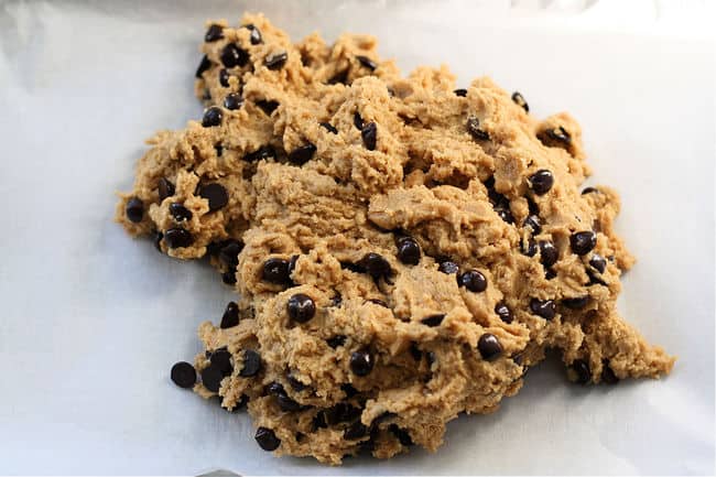 chocolate chip cookie dough on a cookie sheet