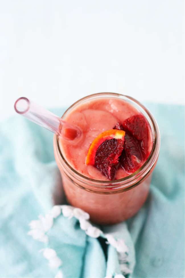 blood orange smoothie in a glass jar