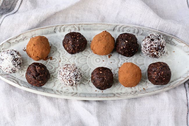 chocolate energy balls on a white tray