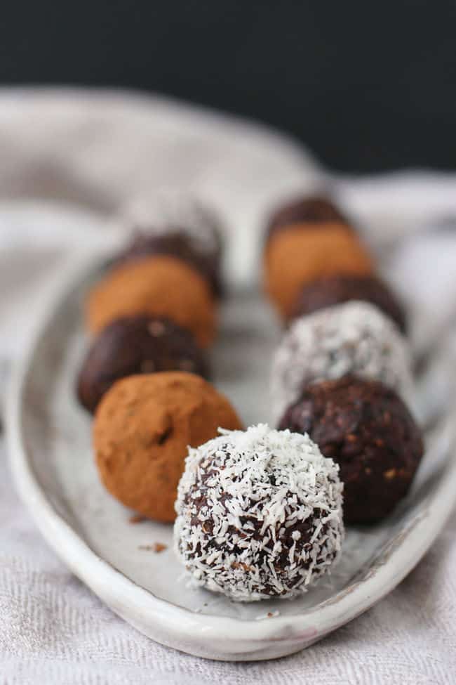 chocolate coconut energy balls on a tray