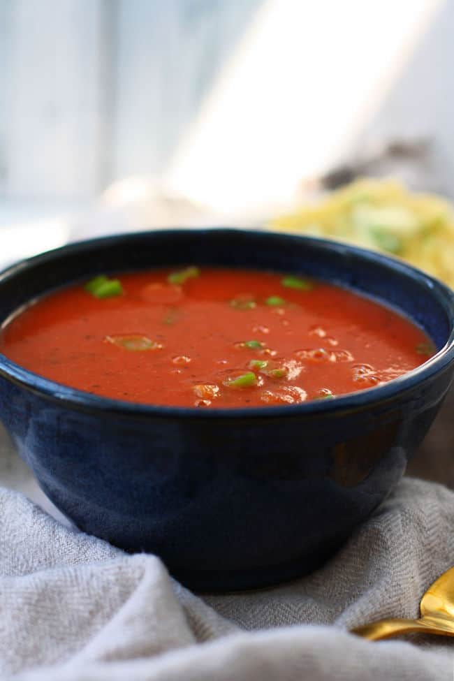 easy tomato soup without dairy in a blue bowl