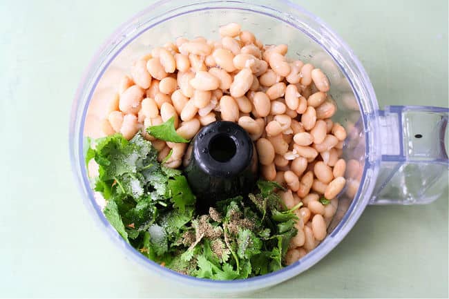 ingredients for white bean dip in a food processor