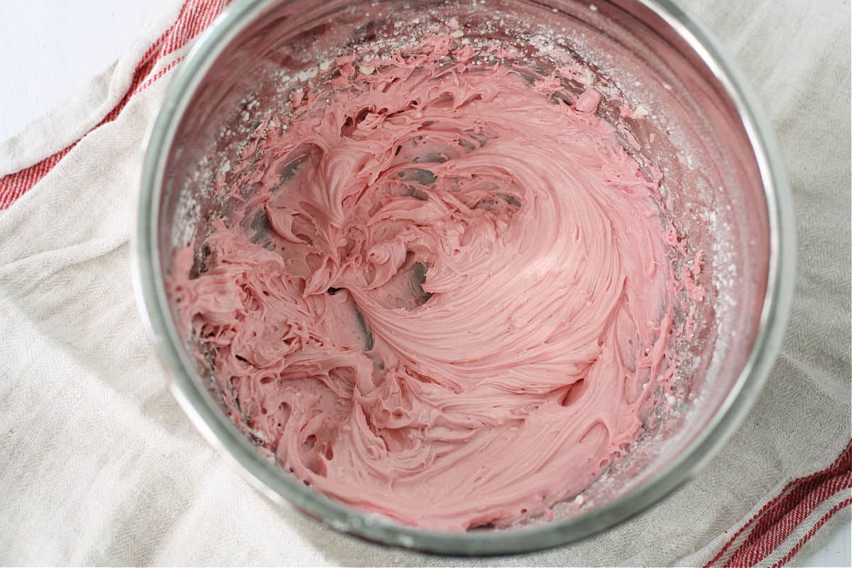 blood orange buttercream icing in a bowl