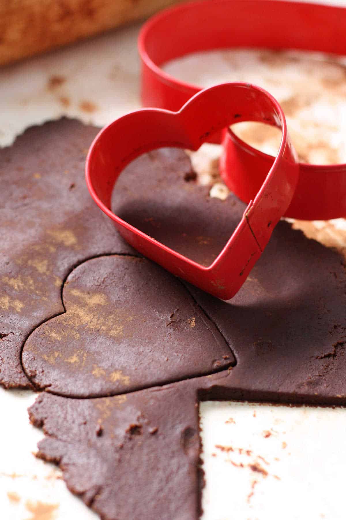 cutting out chocolate sugar cookies