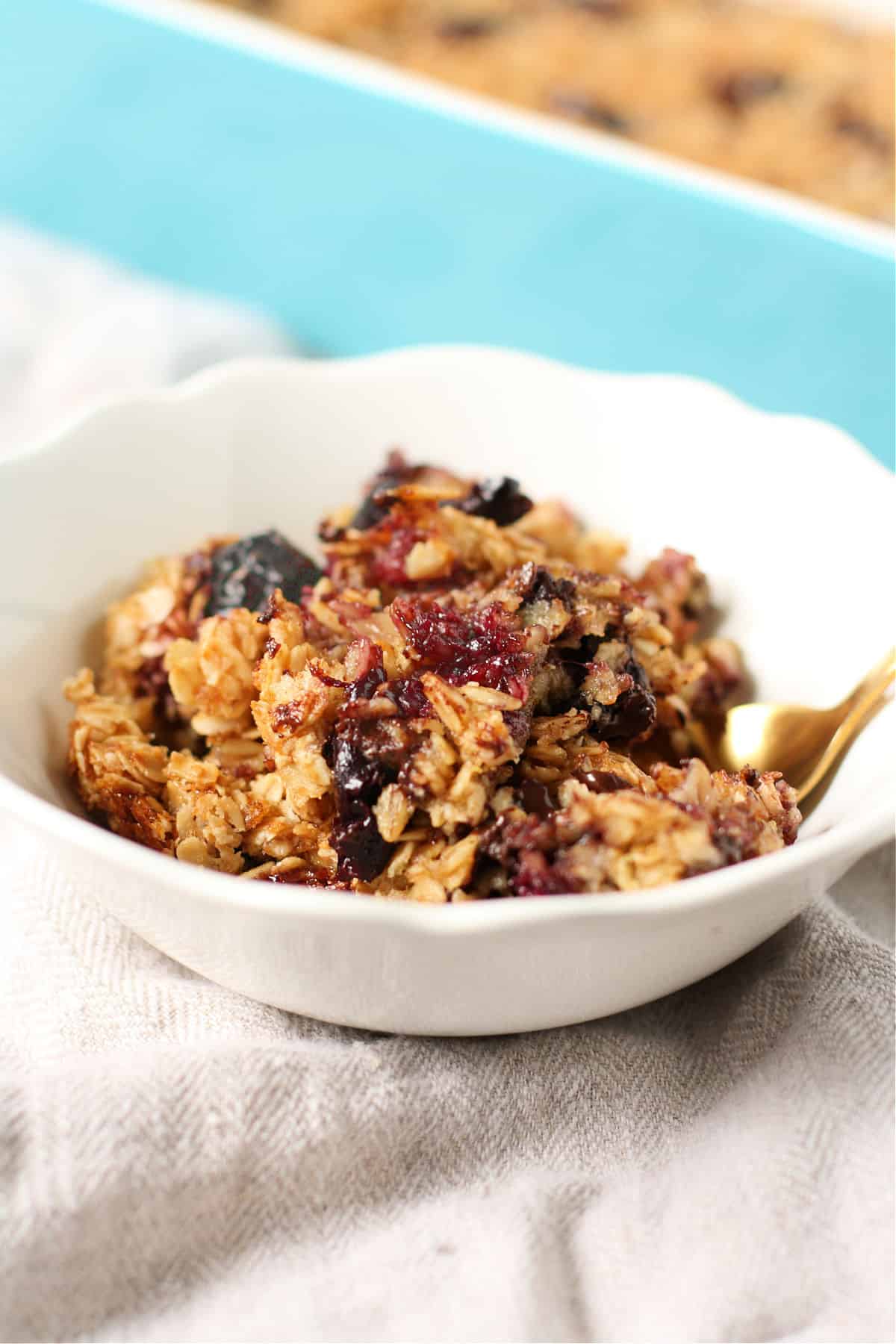egg free baked oatmeal with cherries in a bowl