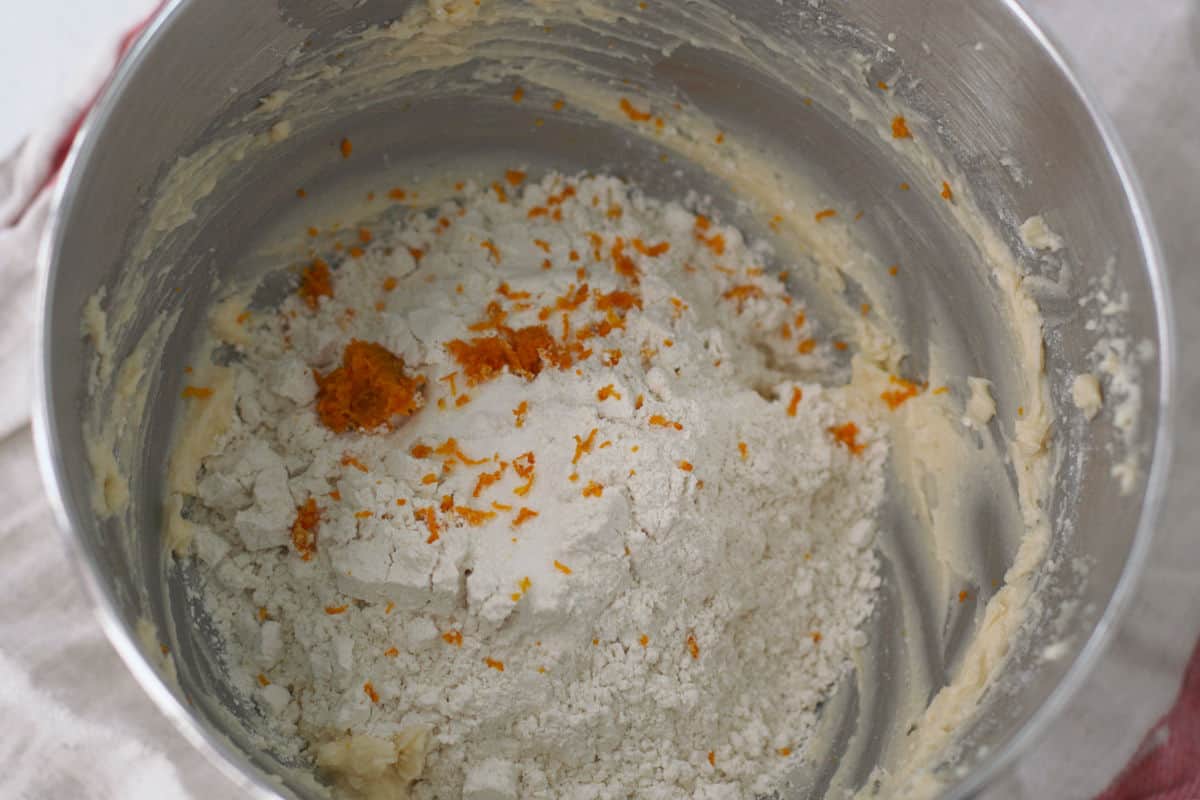 flour and orange zest in bowl