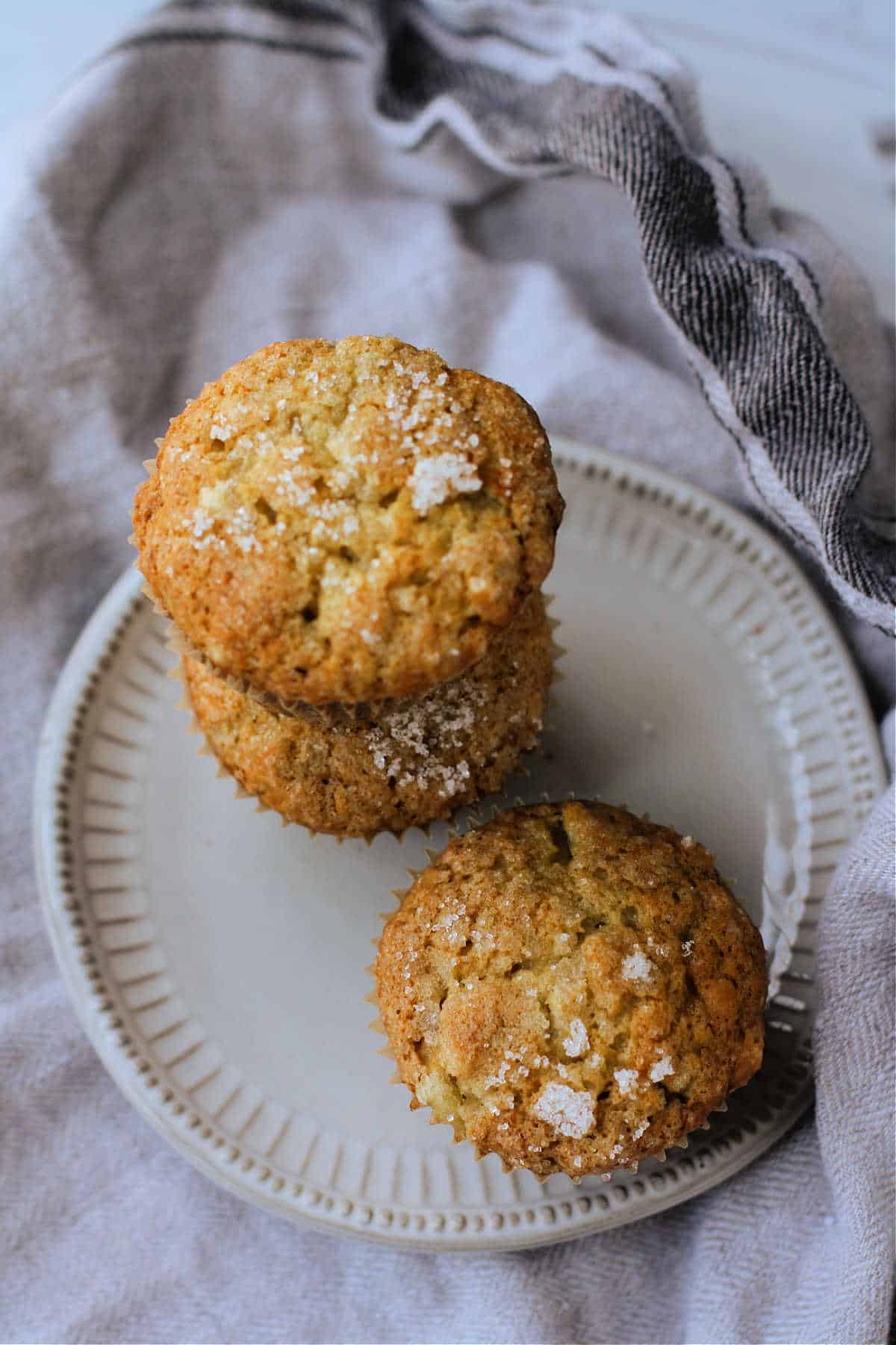 vegan banana muffins with streusel on a white plate