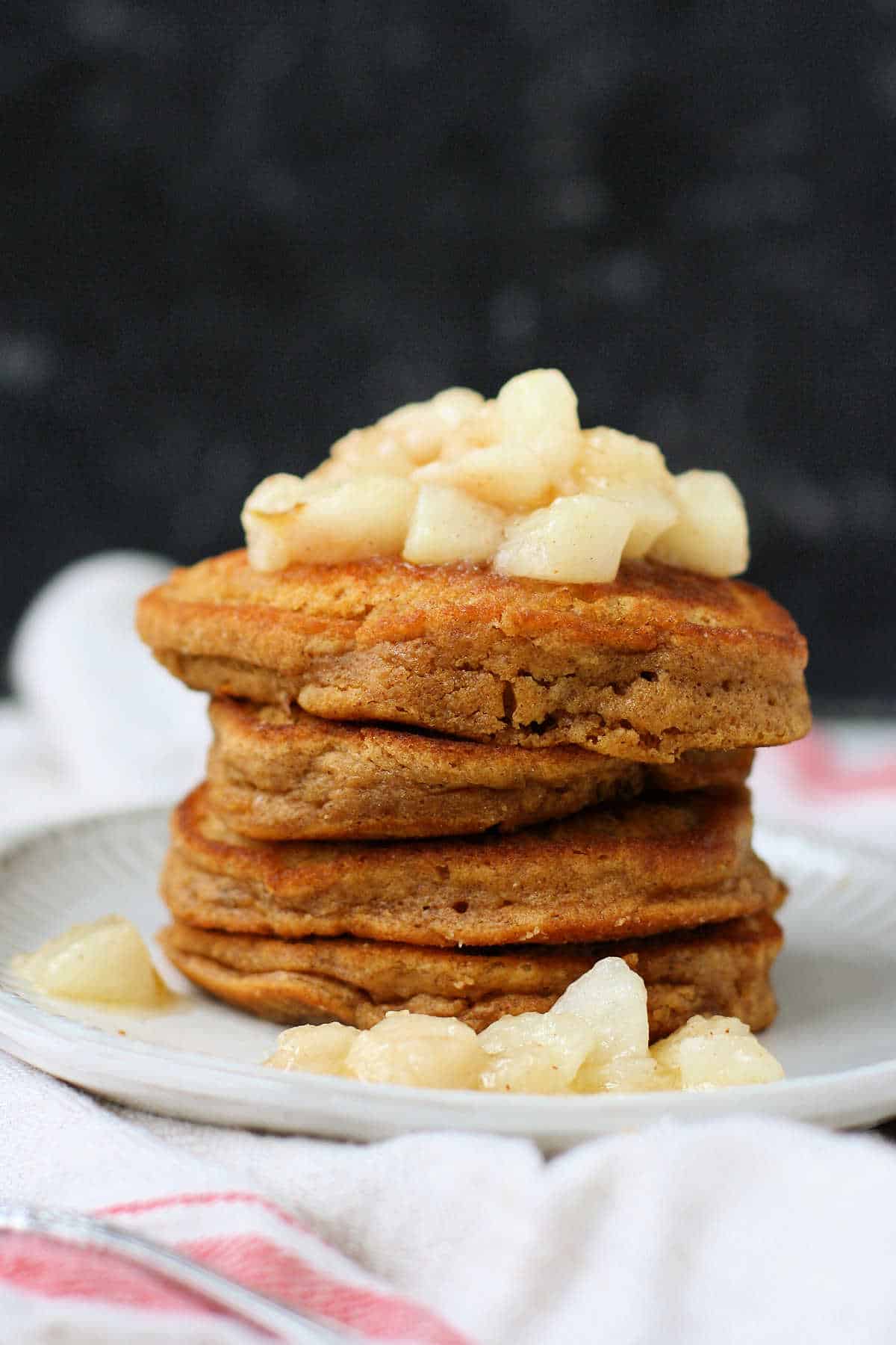 vegan gingerbread pancakes with warm pears on top