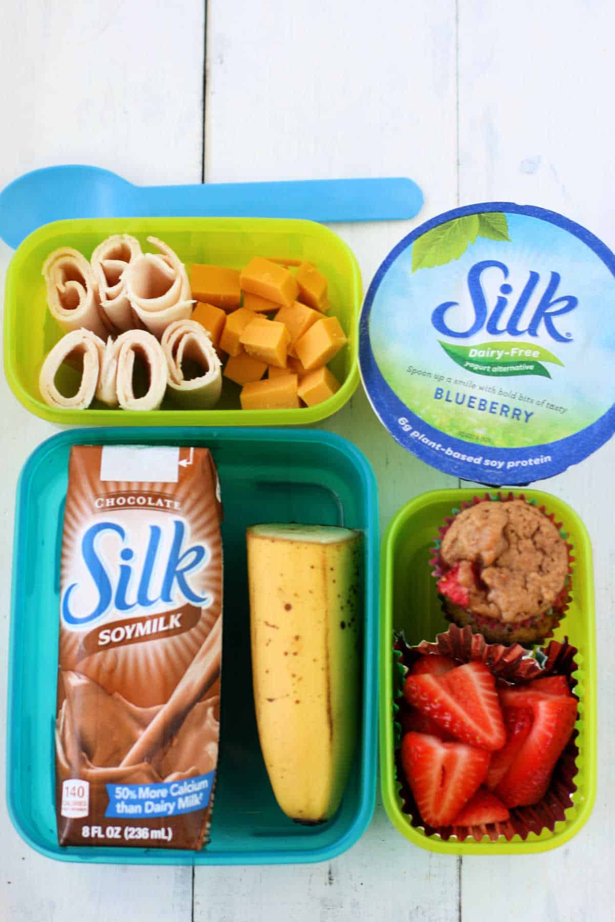 plastic lunch containers with lunchment, dairy free milk, and yogurt