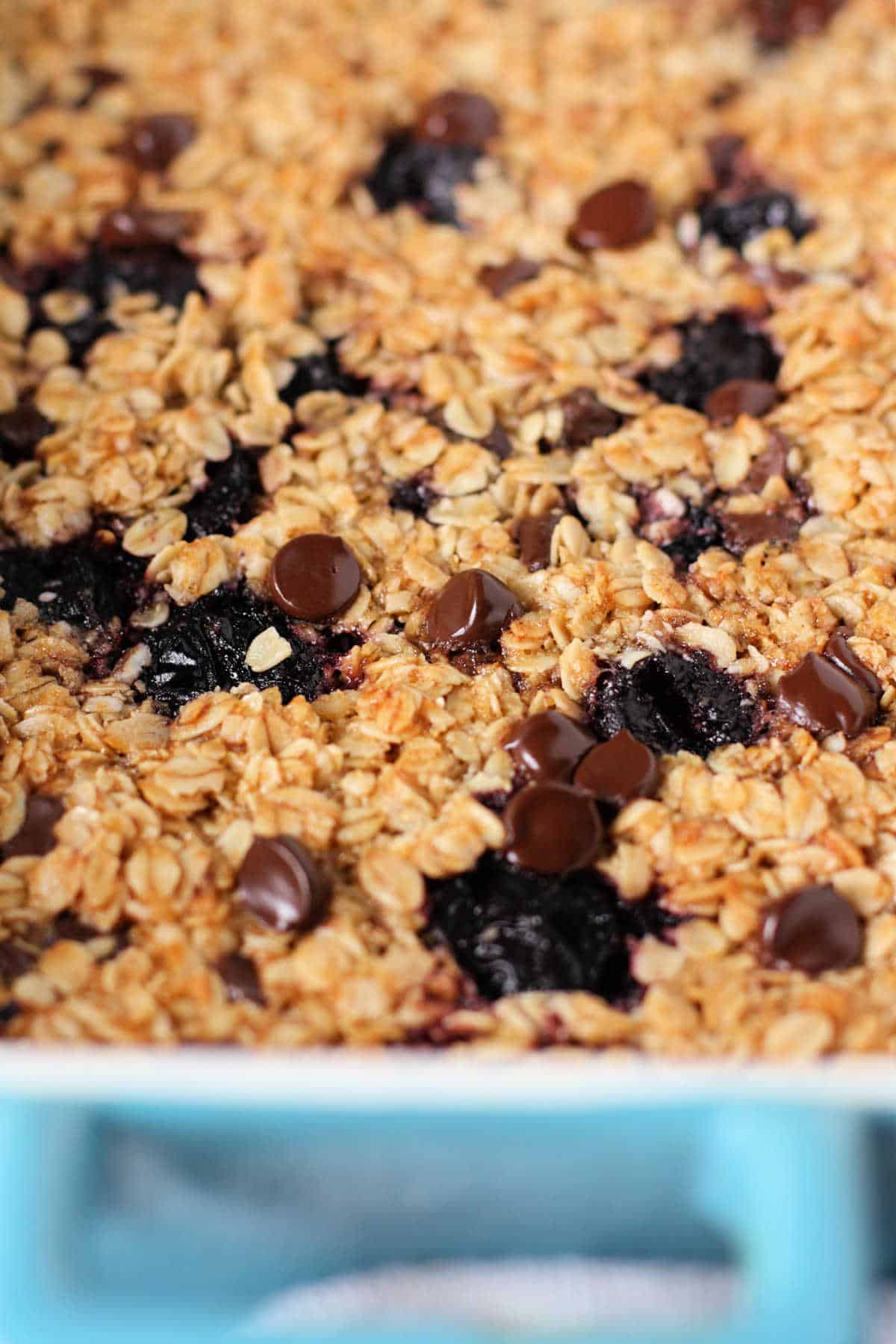 easy dairy free baked oatmeal in a blue casserole dish
