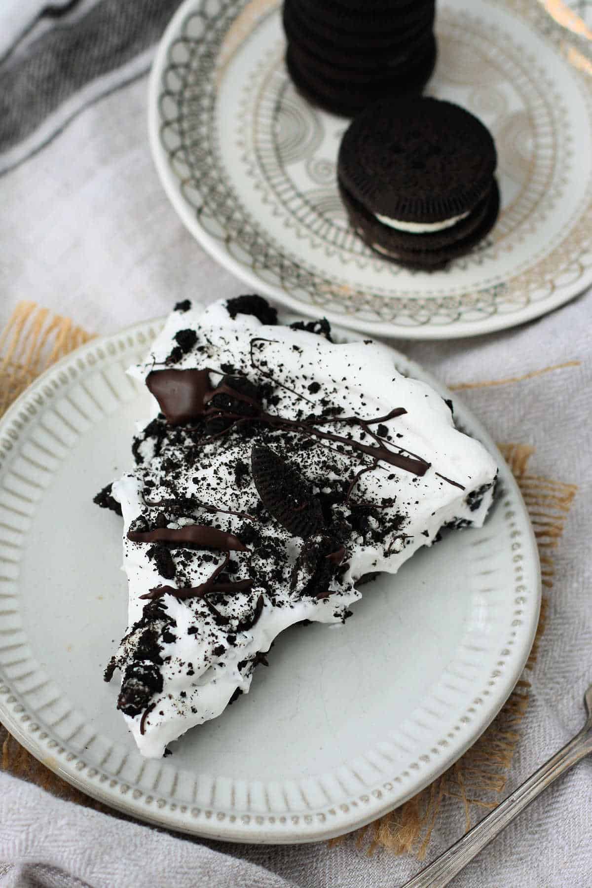 easy no bake cookies and cream pie on a white plate