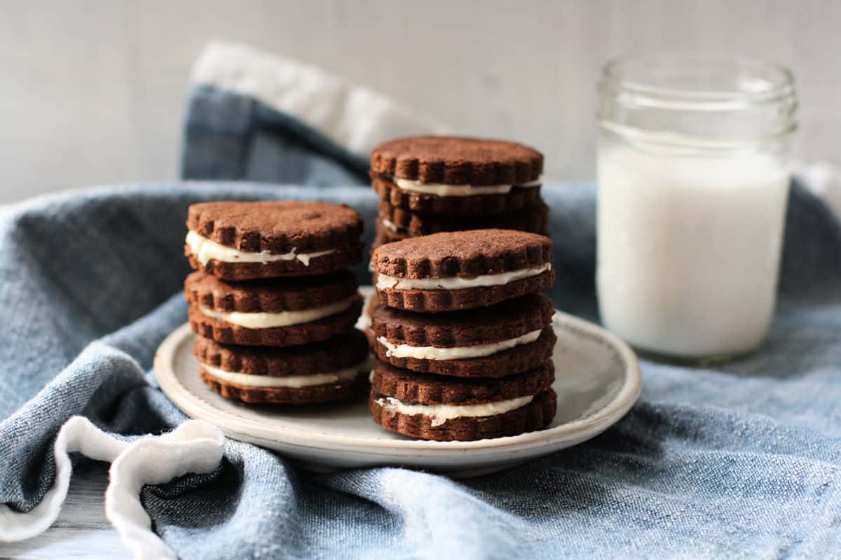 gluten free chocolate sandwich cookies on a plate