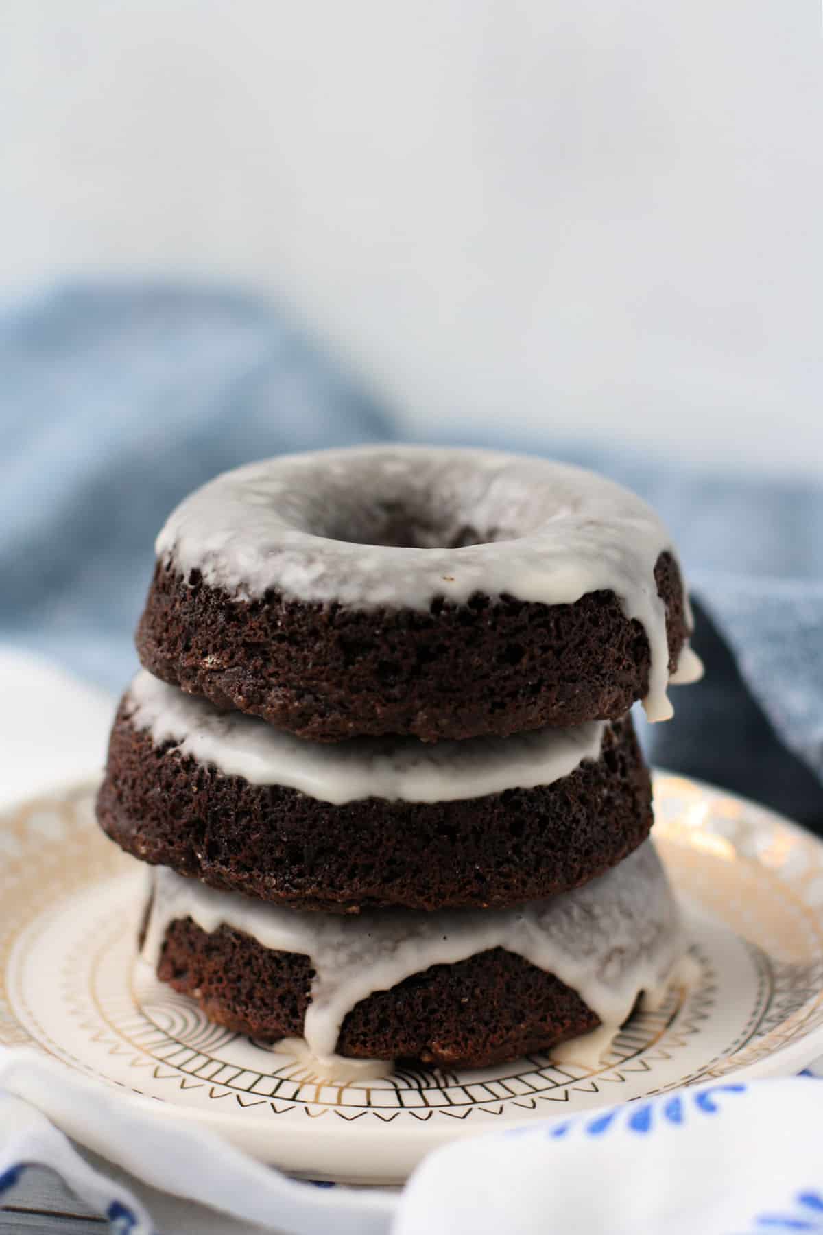 gluten free vegan chocolate donuts on a plate