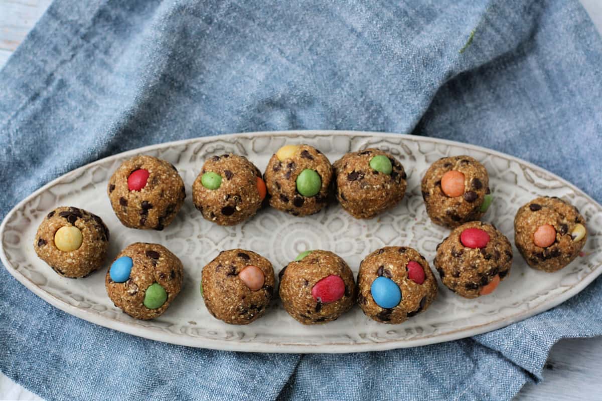 monster cookie dough bites on a white tray