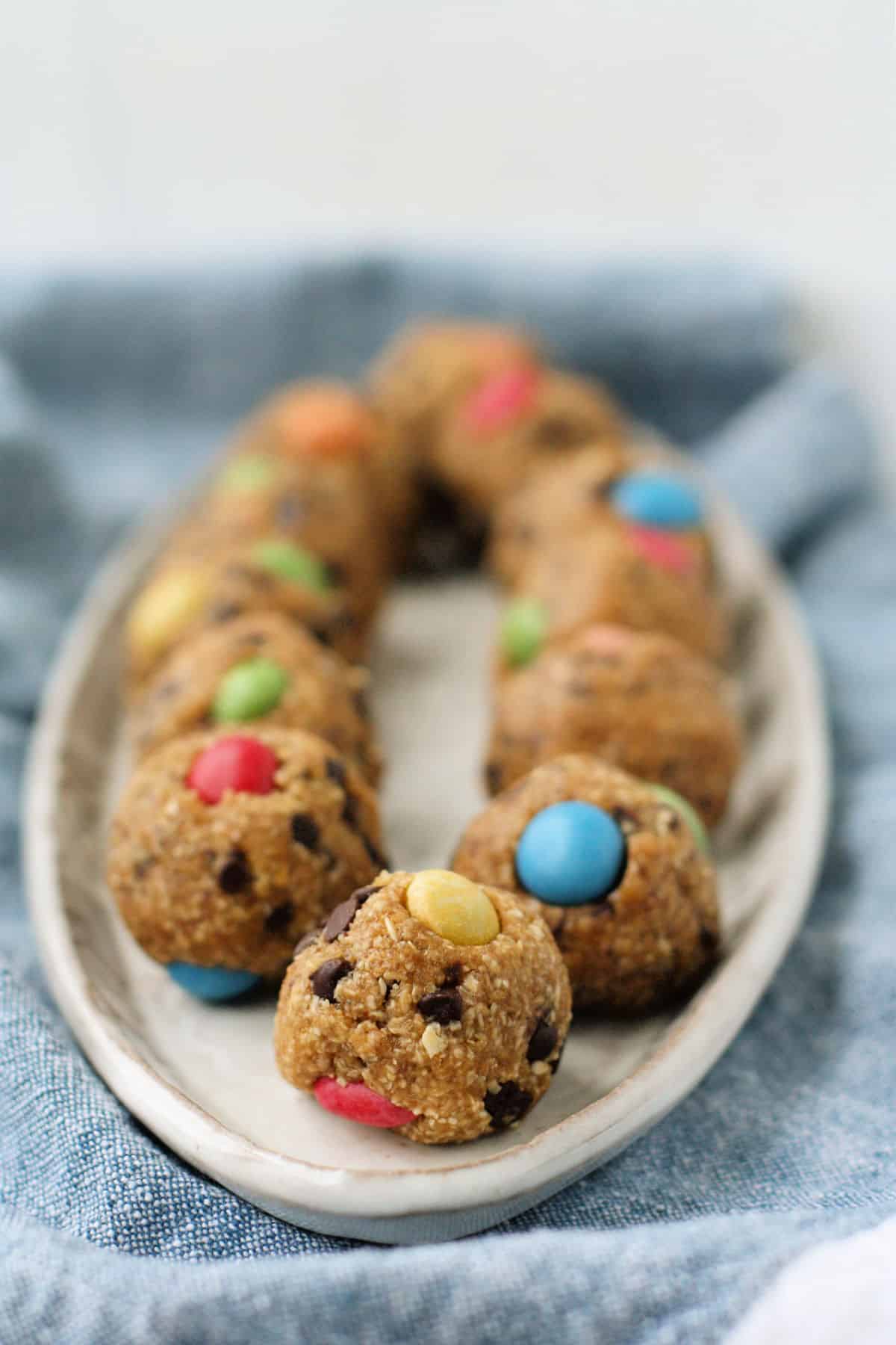 nut free monster cookie dough balls on a tray