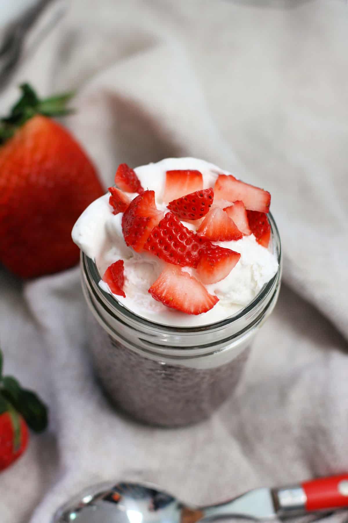 strawberry chia seed pudding with whipped cream