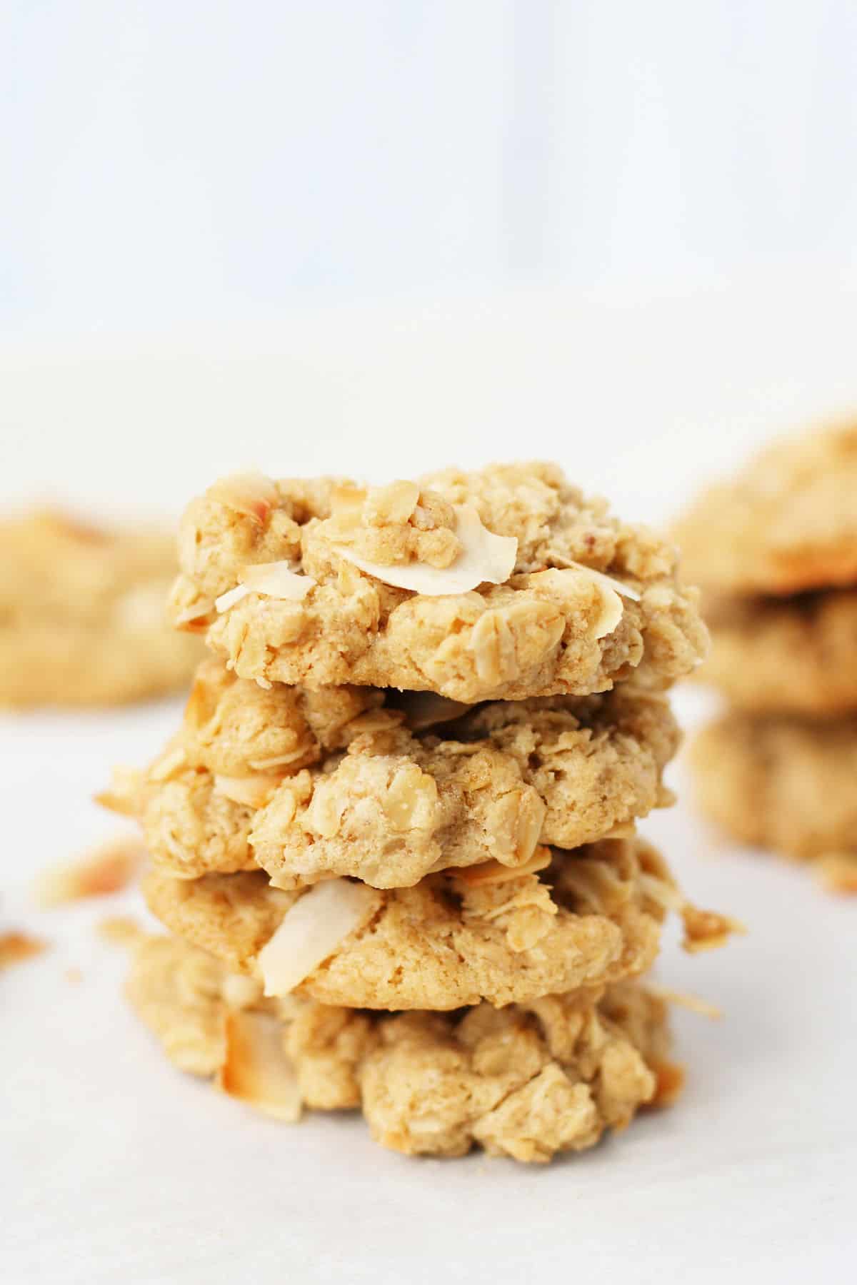 stack of vegan chewy coconut oatmeal cookies
