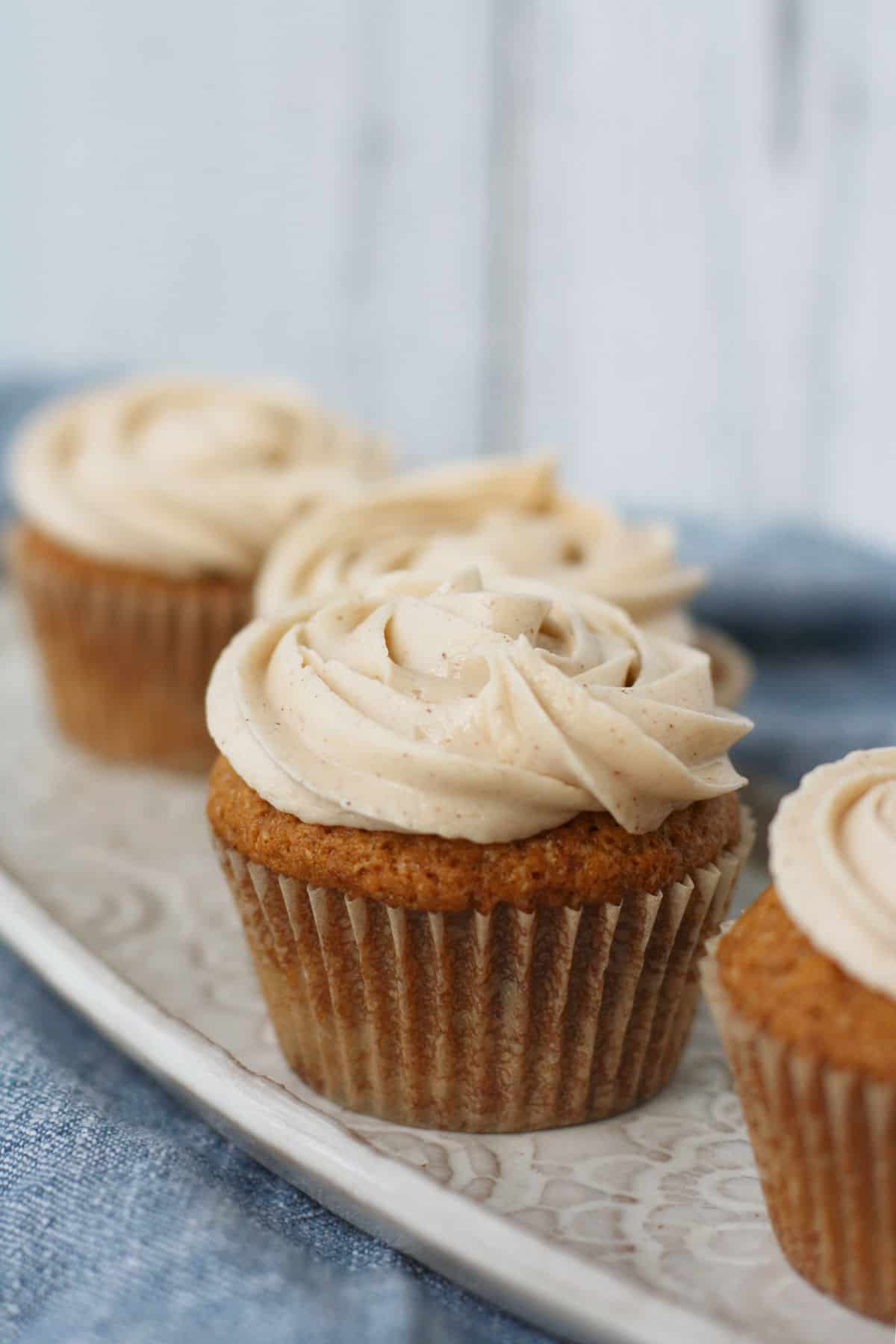 vegan snickerdoodle cupcakes on a tray