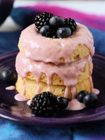 vegan vanilla donuts with berry frosting