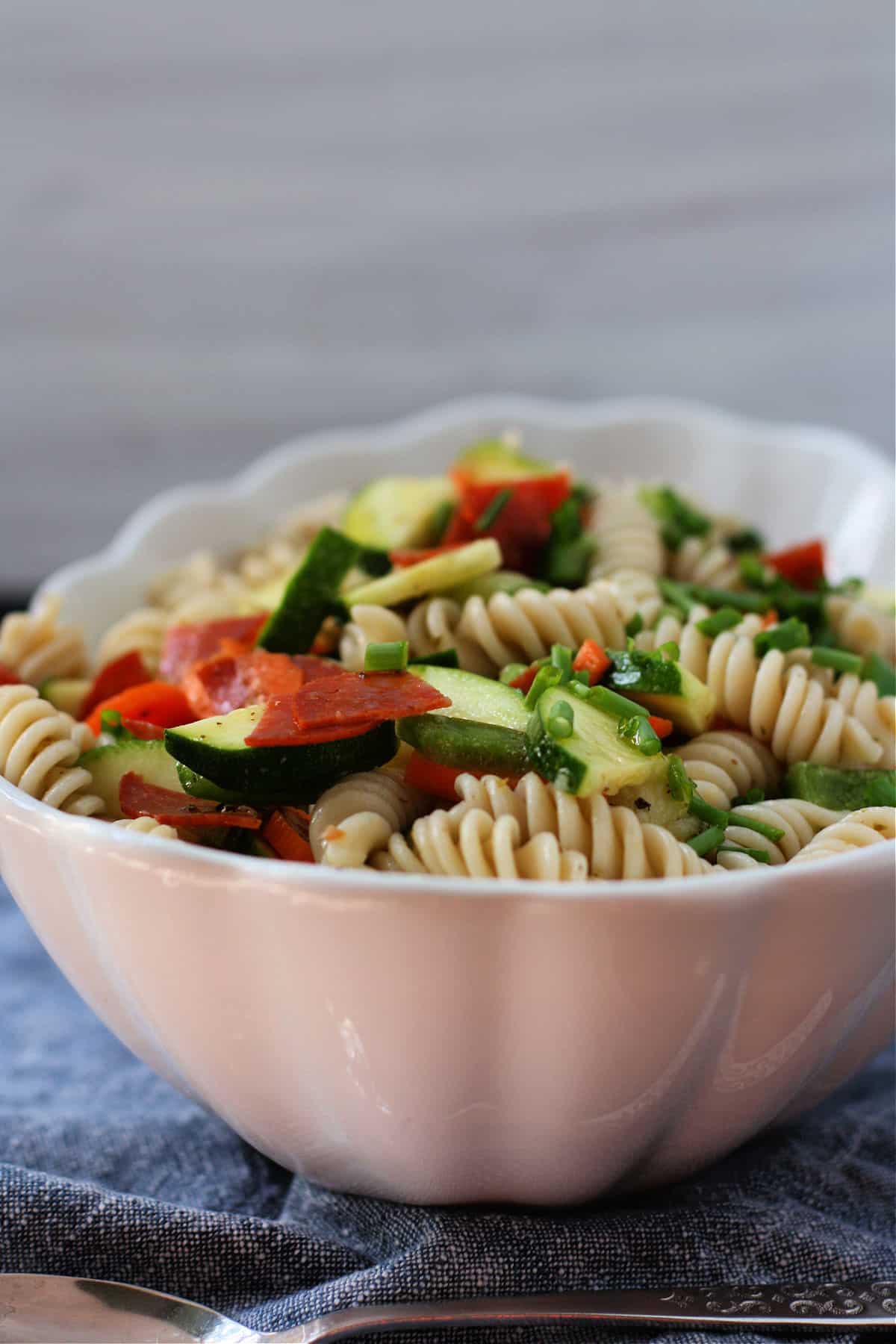 dairy free pepperoni pasta salad in a white bowl