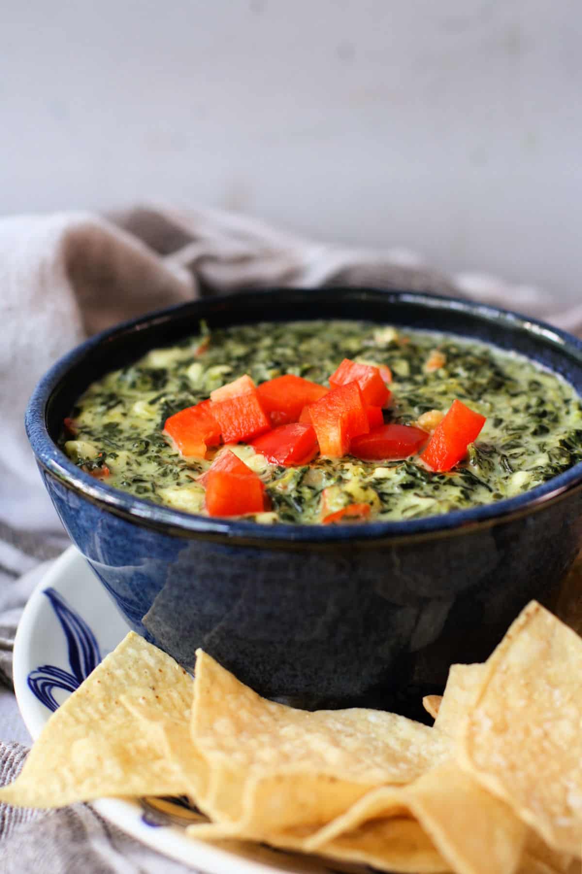 easy vegan spinach dip in a blue bowl