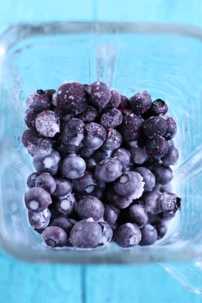 frozen berries in a blender
