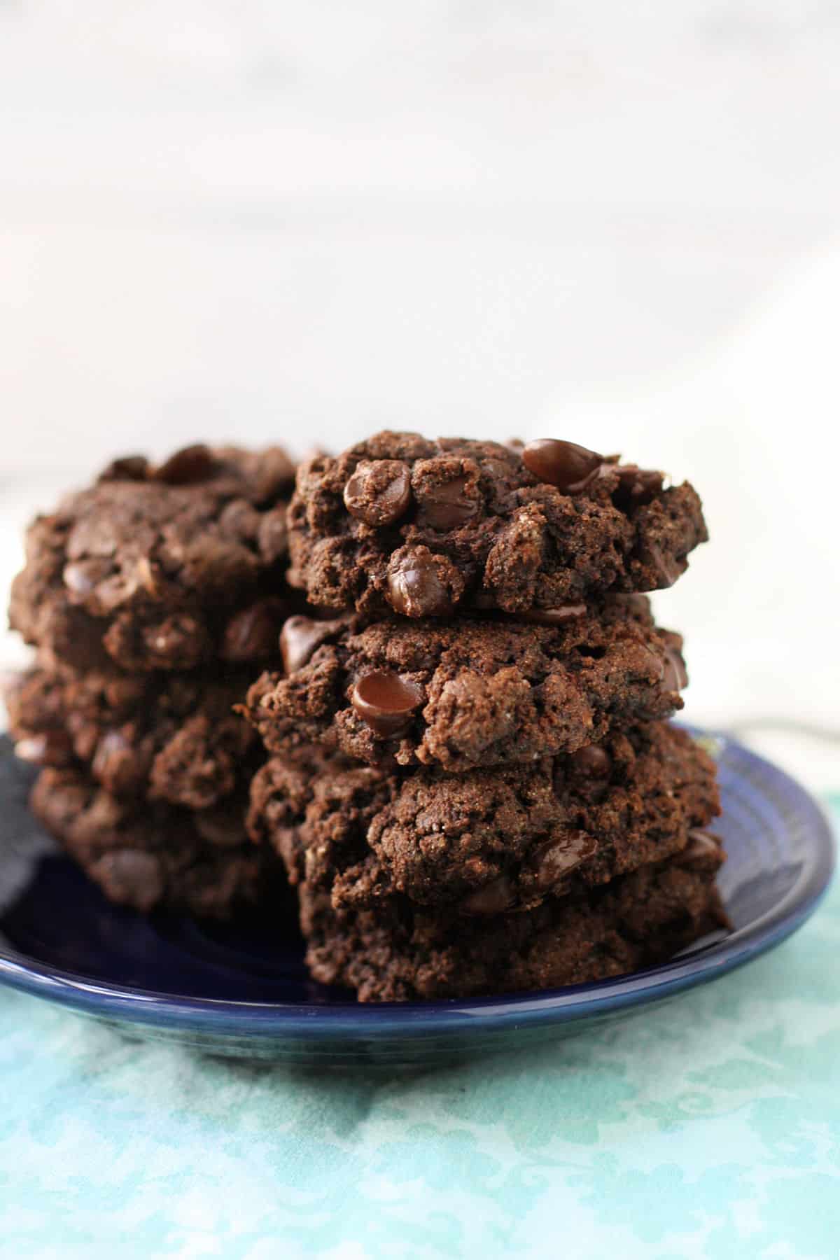 chocolate fudge zucchini cookies stacked on a plate