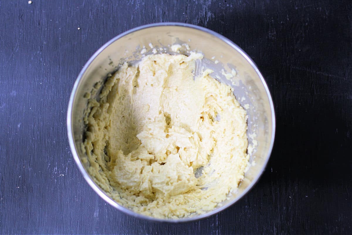 creamed vegan buttery spread and sugar in a mixing bowl