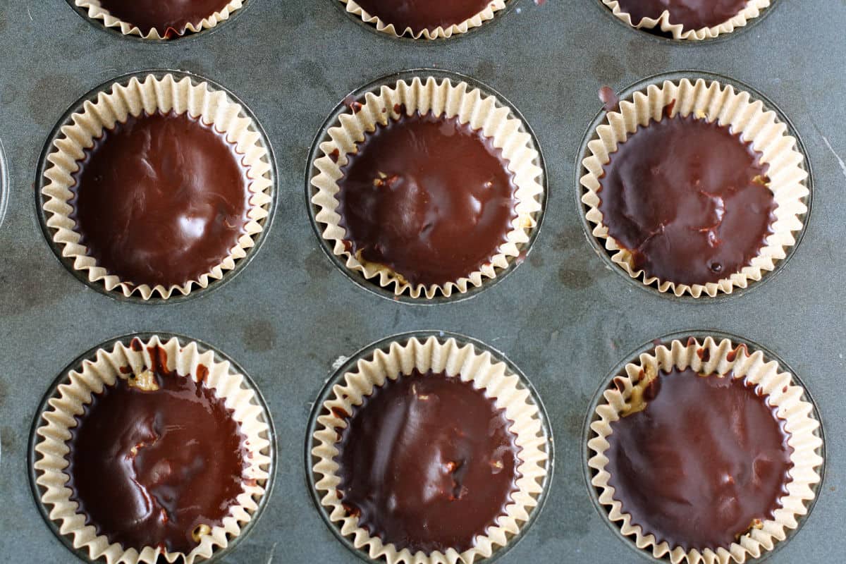 chocolate caramel cups in muffin tin
