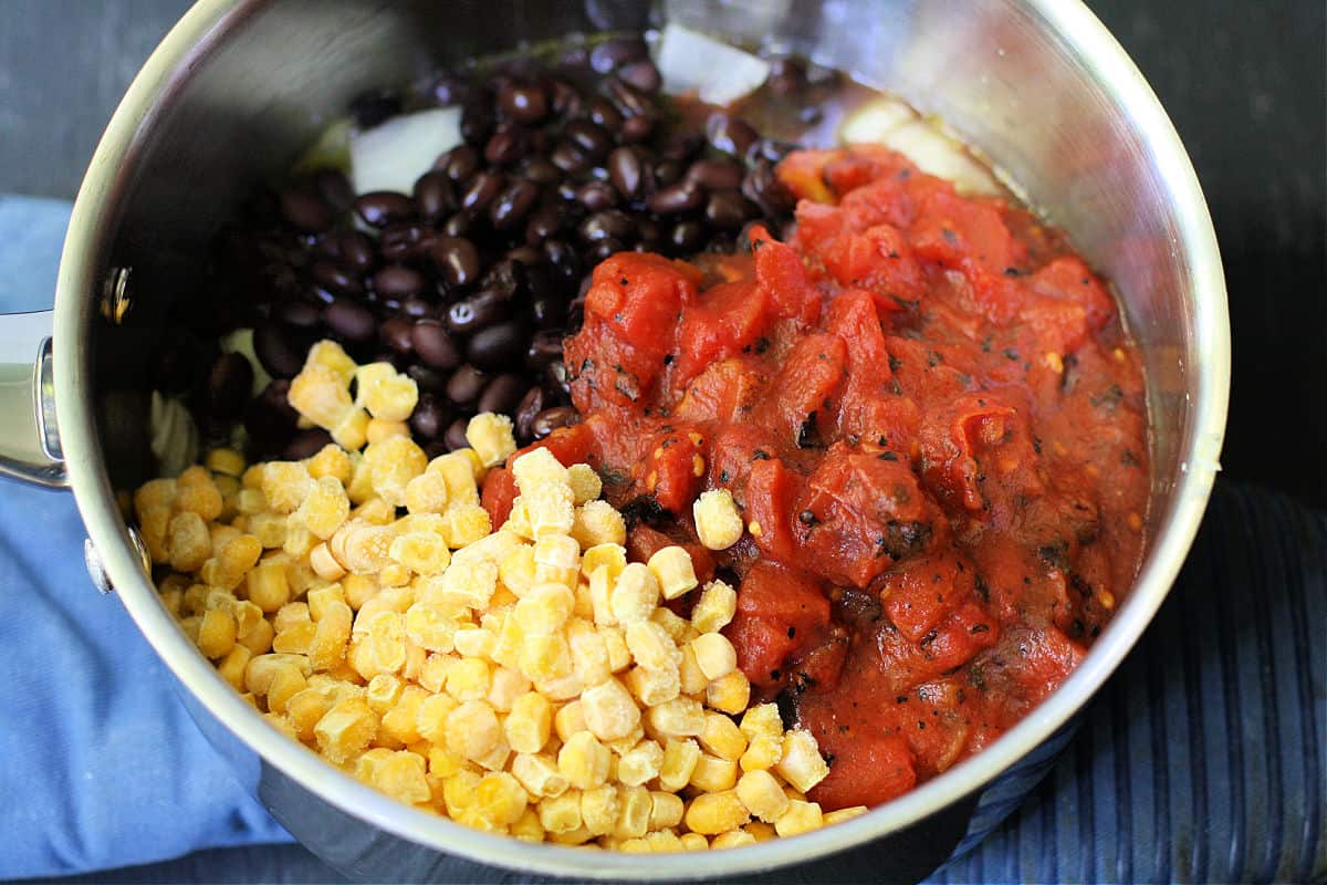 ingredients for black bean soup in a pot
