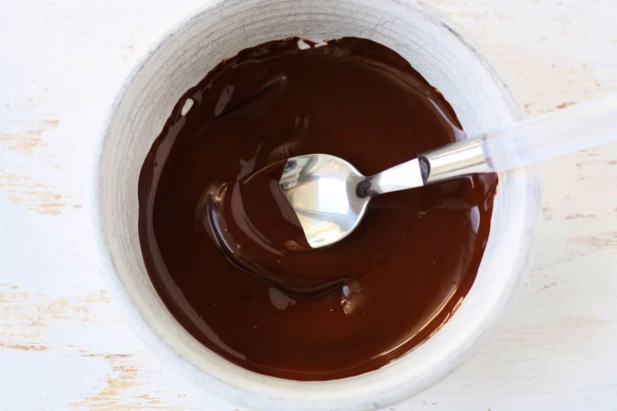 melted dairy free chocolate in a white bowl