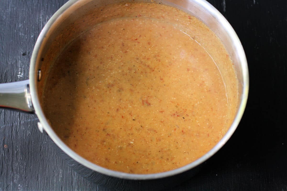 creamy sundried tomato sauce in a pan