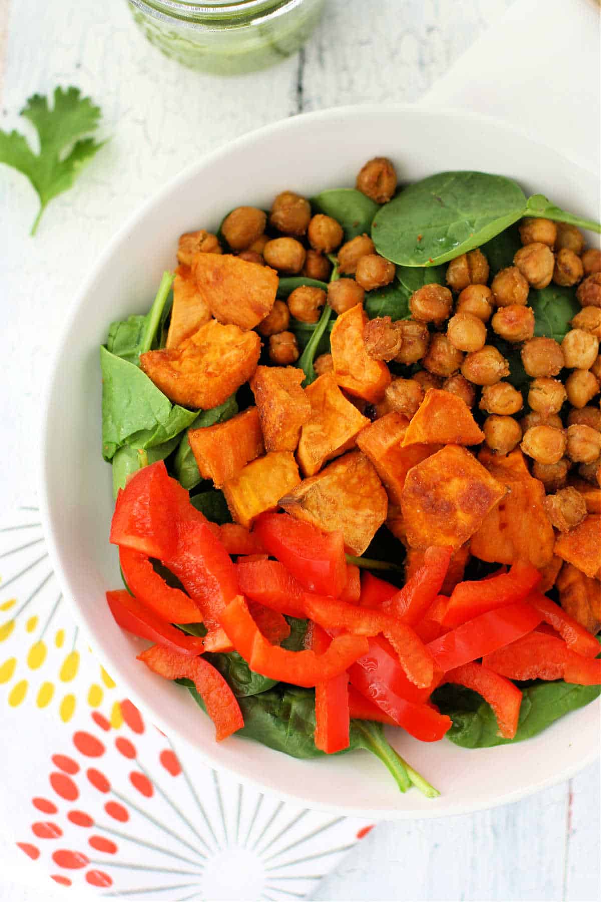 spinach salad with roasted chickpeas and sweet potatoes
