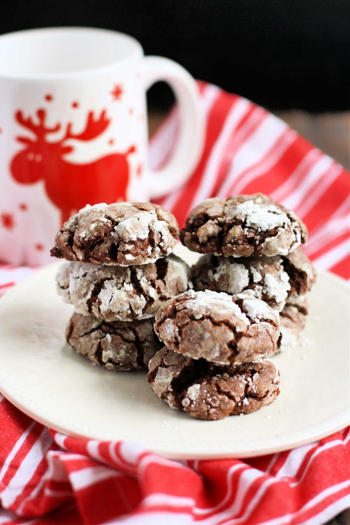 gluten free vegan chocolate crinkle cookies on a white plate