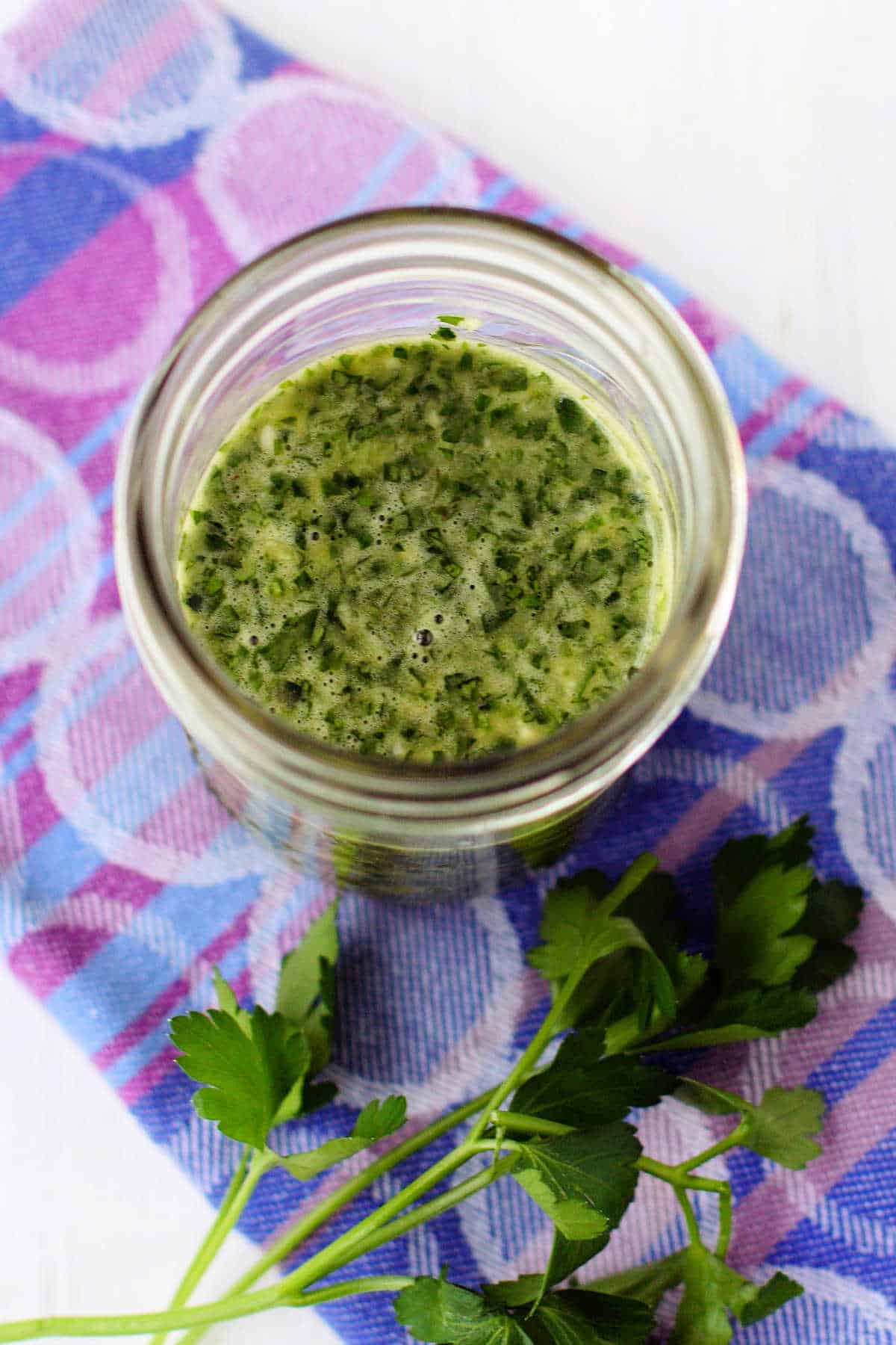 green herb sauce in a jar