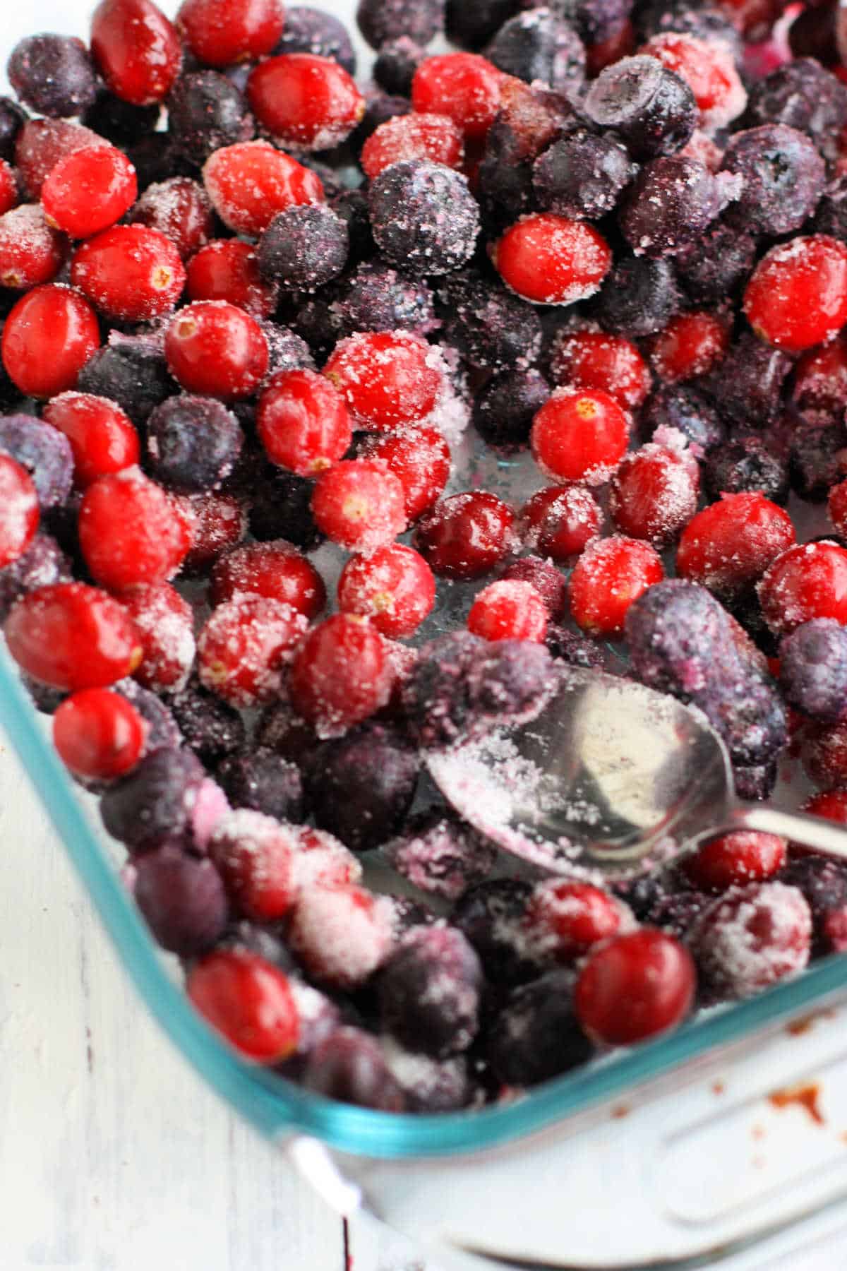 blueberries and cranberries with sugar
