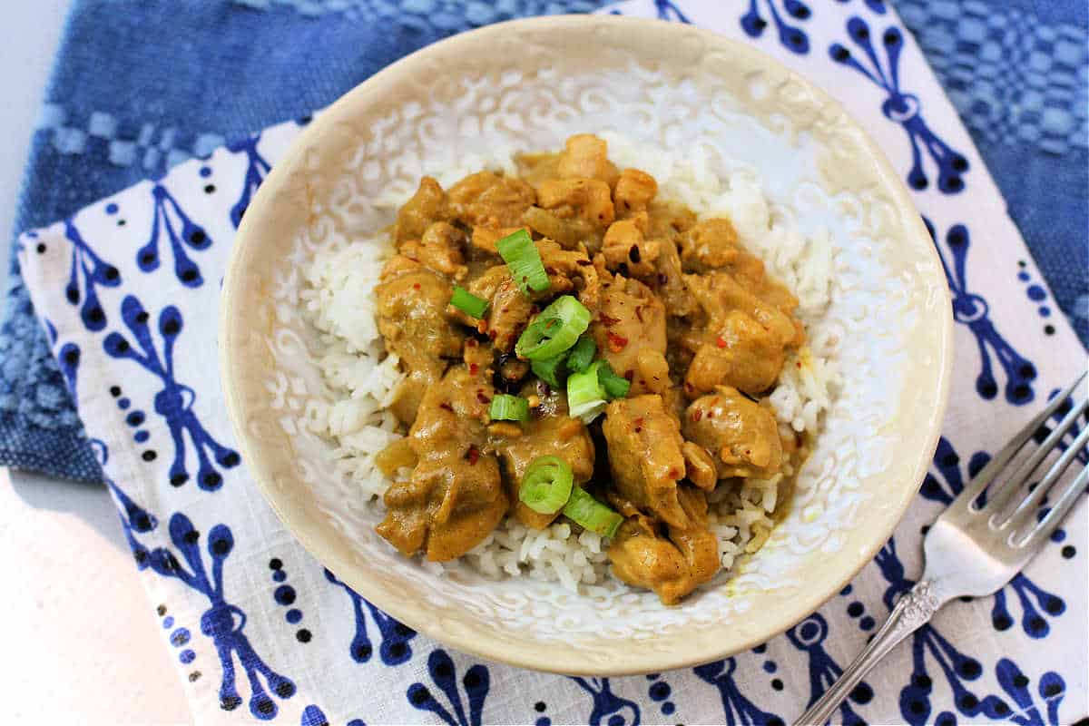 bowl of coconut chicken curry with rice