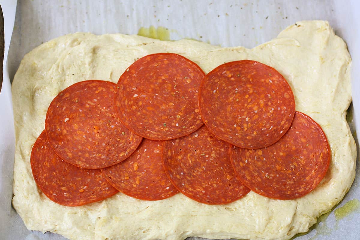 bread dough with pepperoni