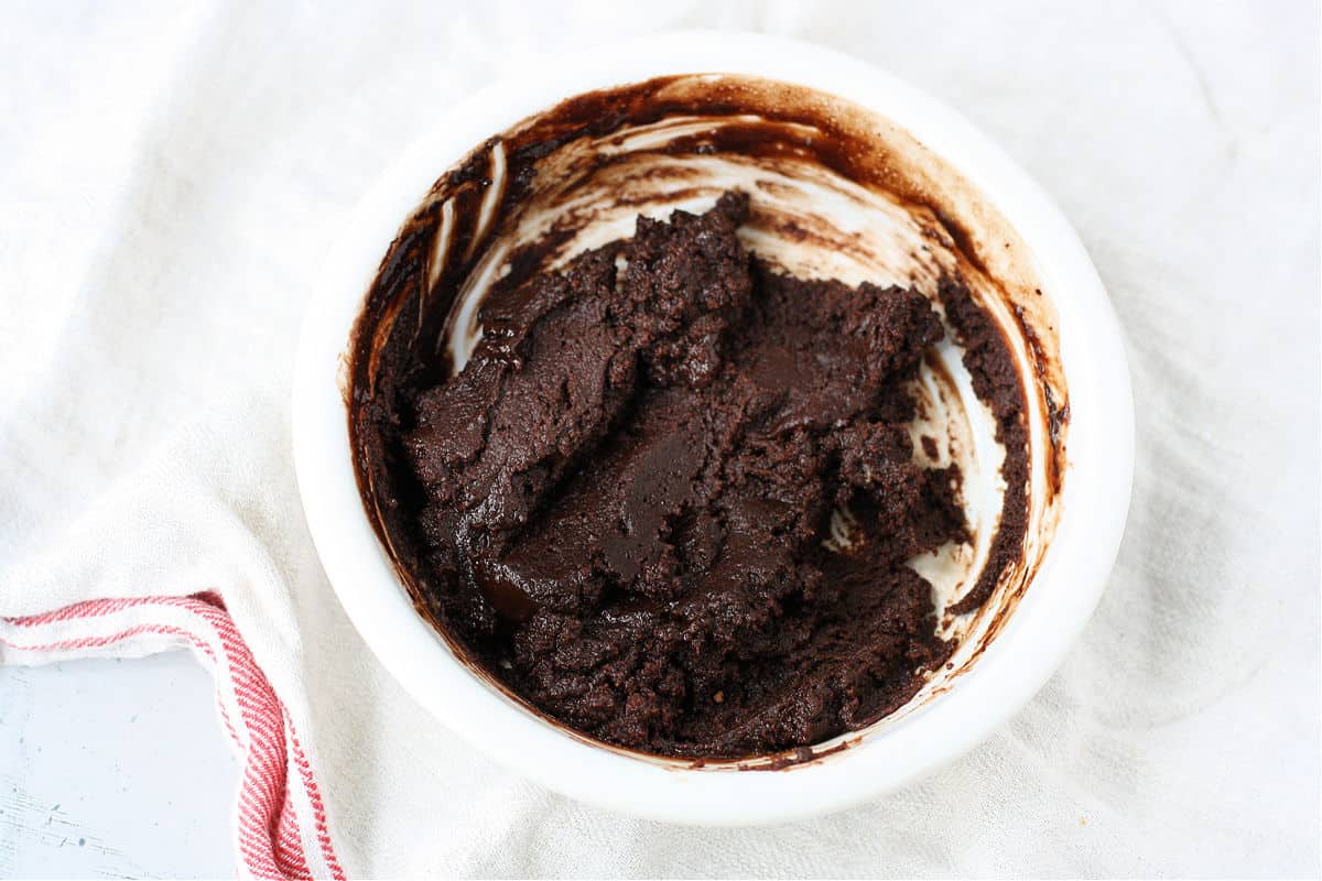 brownie batter in white bowl